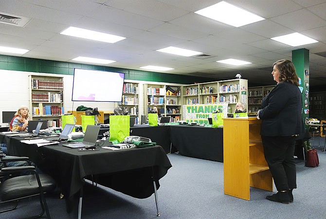 North Callaway Assistant Superintendent Nicole Buschmann, right, updates school board members on the project to update North Callaway's Comprehensive School Improvement Plan.