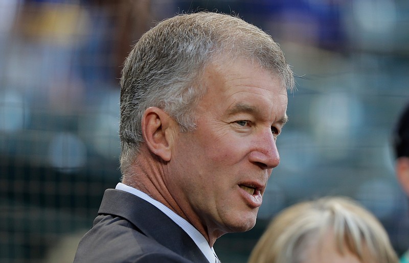 FILE - In this Aug. 3, 2018, file photo, Seattle Mariners president Kevin Mather stands on the field before the team's baseball game against the Toronto Blue Jays in Seattle. Mather apologized late Sunday night, Feb. 21, 2021, for comments made during a recent online event where he expressed opinions about organizational strategy, personnel moves and club finances. Mather's comments came in a speech to the Bellevue, Wash., Breakfast Rotary Club on Feb. 5 and were posted online over the weekend. (AP Photo/Ted S. Warren, File)