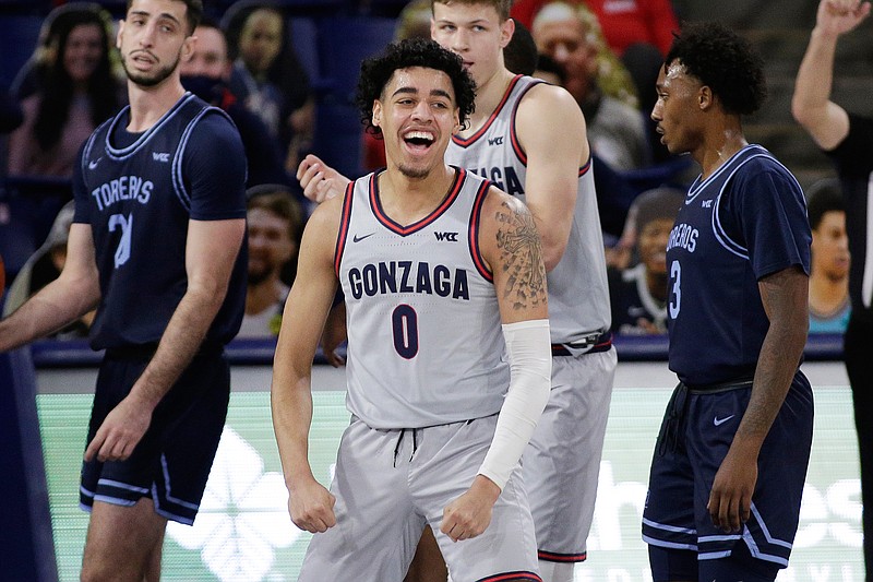 Gonzaga guard Julian Strawther celebrates his basket during the second half of an NCAA college basketball game against San Diego in Spokane, Wash., Saturday, Feb. 20, 2021. (AP Photo/Young Kwak)