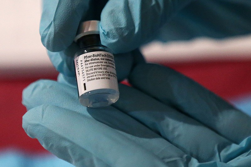 A vial of the Pfizer-BioNTech COVID-19 vaccine at Temple University Hospital in North Philadelphia in December. (Tim Tai/Philadelphia Inquirer/TNS)