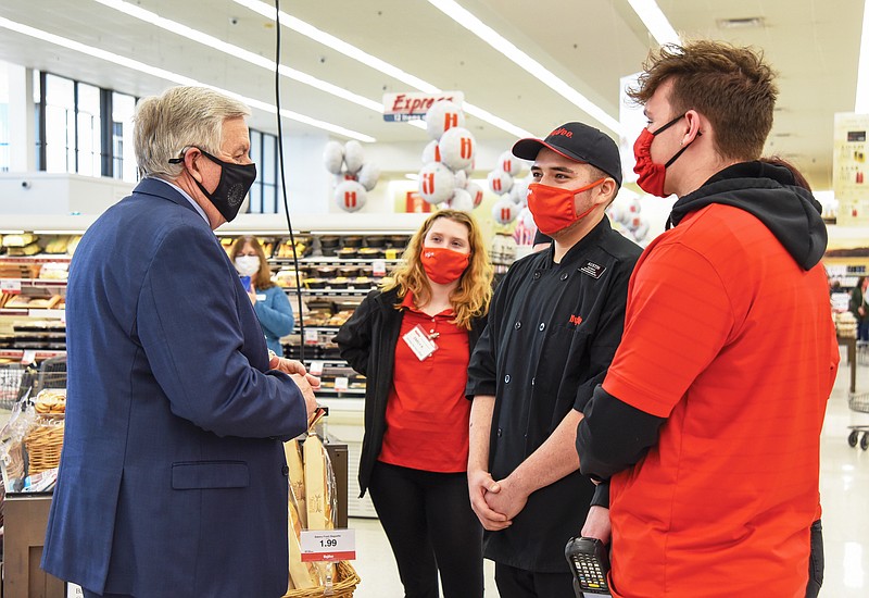 During Gov. Parson's visit Monday, he spoke with a group of employees, from near to far, Rydale Schuster, Austin Salsman and Emily Rush.