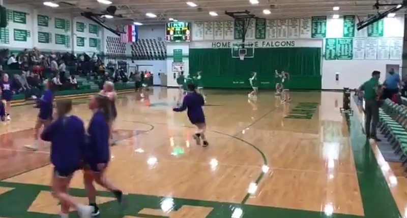 Players warm up Monday night, Feb. 22, 2021, as the Blair Oaks Lady Falcons and Hallsville prepare to play basketball in Wardsville. Blair Oaks scored the first 12 points of the second half to take the lead on its way to a 50-40 victory in Tri-County Conference action.