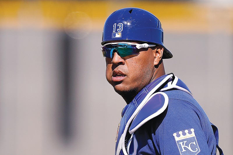 Royals catcher Salvador Perez watches a drill during practice Monday in Surprise, Ariz.