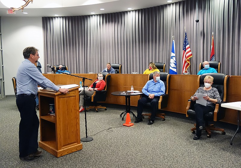 <p>Helen Wilbers/For the News Tribune</p><p>Fulton Utilities Superintendent Darrell Dunlap, left, on Tuesday, Feb. 23, 2021, fills Fulton City Council members in on the damage done to Fulton’s financial reserves during a recent natural gas price spike.</p>