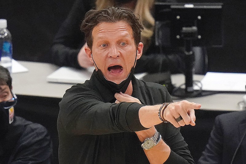 Jazz coach Quin Snyder shouts to his team in the second half of Wednesday night's win against the Lakers in Salt Lake City.