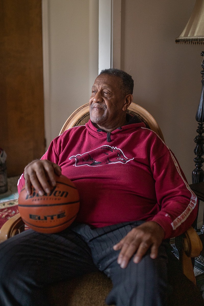 Vernon Murphy poses with a basketball in his home in Texarkana, Texas. Murphy was born and raised in Texarkana and went on to play basketball at the University of Arkansas in the fall of 1968, where he still holds records for his skill. Murphy ended up back in Texarkana after being called to ministry during his time in Jerusalem.