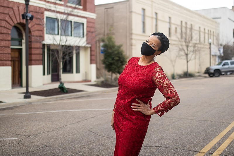 Former Givenchy model Carol Collins-Miles poses on Texas Boulevard in downtown Texarkana, Texas.