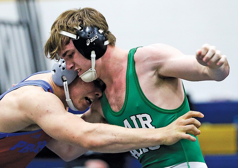 Camden Meeks of Blair Oaks wrestles against Priory's Adam Rolwes for first place at 182 pounds during Saturday's Class 2 Sectional 2 Tournament at Rackers Fieldhouse.