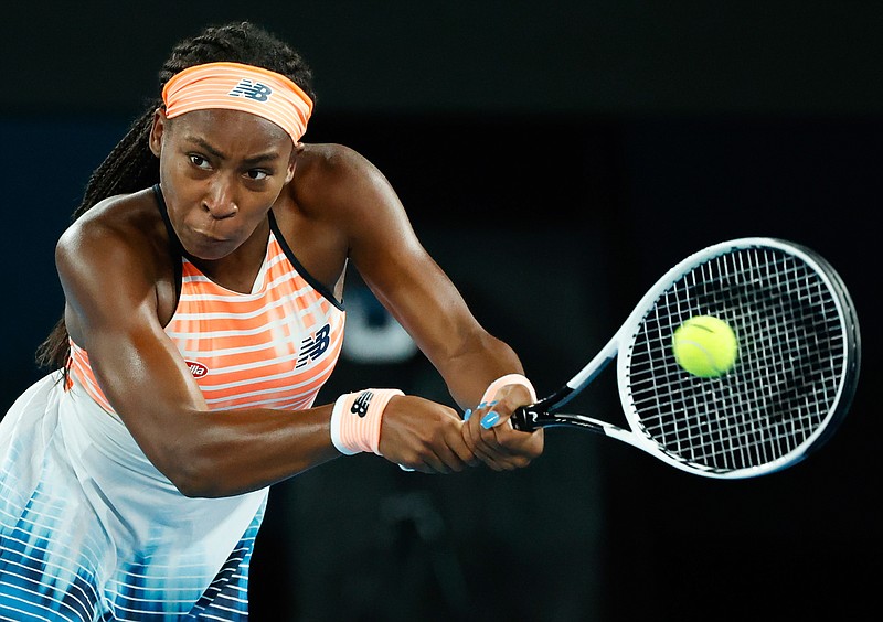 United States' Coco Gauff makes a backhand return to Ukraine's Elina Svitolina during their second round match at the Australian Open tennis championship in Melbourne, Australia, Thursday, Feb. 11, 2021.(AP Photo/Rick Rycroft)