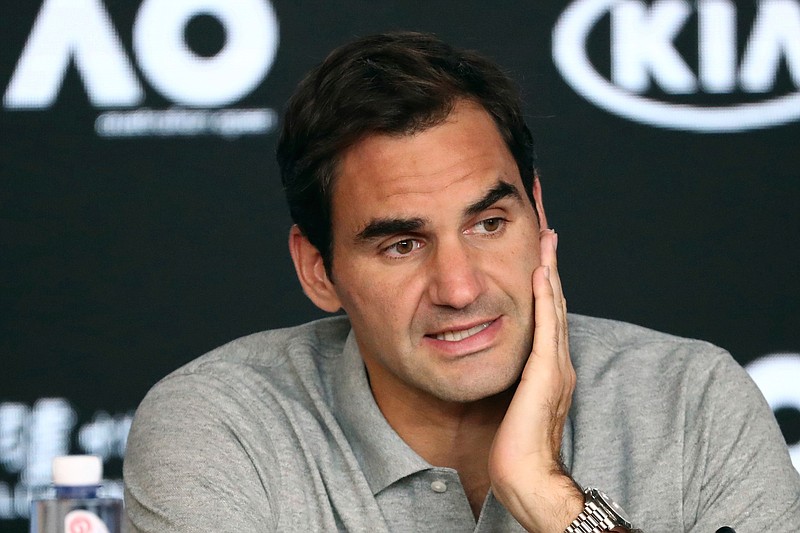 FILE - In this Jan. 30, 2020, file photo, Switzerland's Roger Federer speaks during a press conference following his semifinal loss to Serbia's Novak Djokovic at the Australian Open tennis championship in Melbourne, Australia. Federer is withdrawing from this month's Miami Open so he can spend extra time preparing to "work his way back out on tour," his agent told The Associated Press on Monday, March 1, 2021. (AP Photo/Dita Alangkara, File)