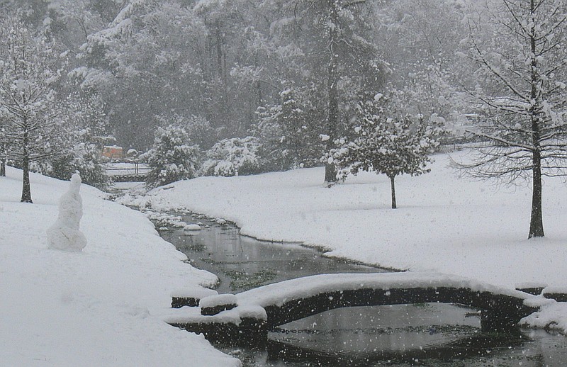 Here's another variation of Where Is It? — both the mystery and answer are explained here. This mystery picture is not what it appears. This is not a snowfall scene from a few days ago. Do you know what year the snow fell this heavily here in Atlanta, especially on the outdoor bridge and front lawn of the Atlanta District of the Texas Department of Transportation as shown here? It was in the last week of February 2015, six years ago. Notice the snowman at left. It seems February is a month to be reckoned with.