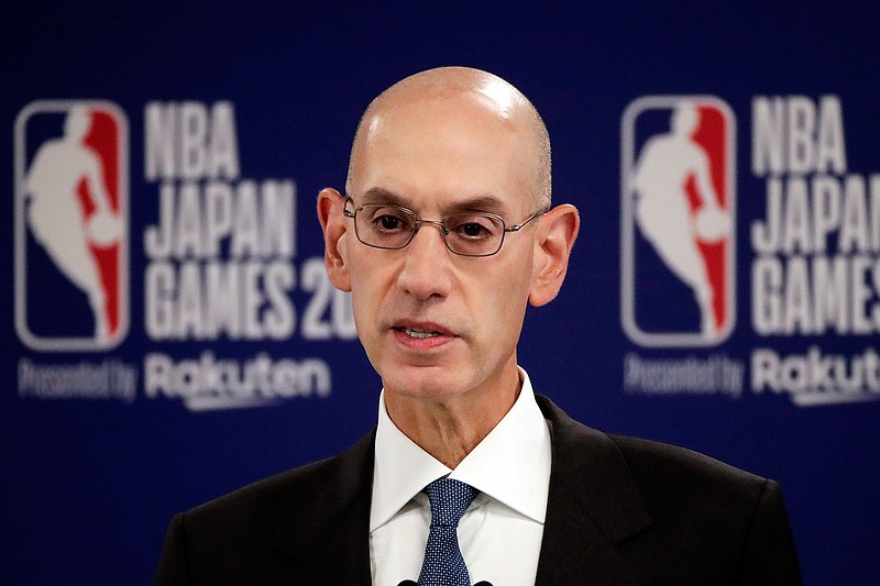 in this Oct. 8, 2019, file photo, NBA Commissioner Adam Silver speaks at a news conference before an NBA preseason basketball game between the Houston Rockets and the Toronto Raptors in Saitama, near Tokyo. Silver, in an interview with The Associated Press on Friday, Feb. 26, 2021, defended the league's decision to have an All-Star Game in Atlanta on March 7 and said he believes the league can do so safely during a pandemic. (AP Photo/Jae C. Hong, File)