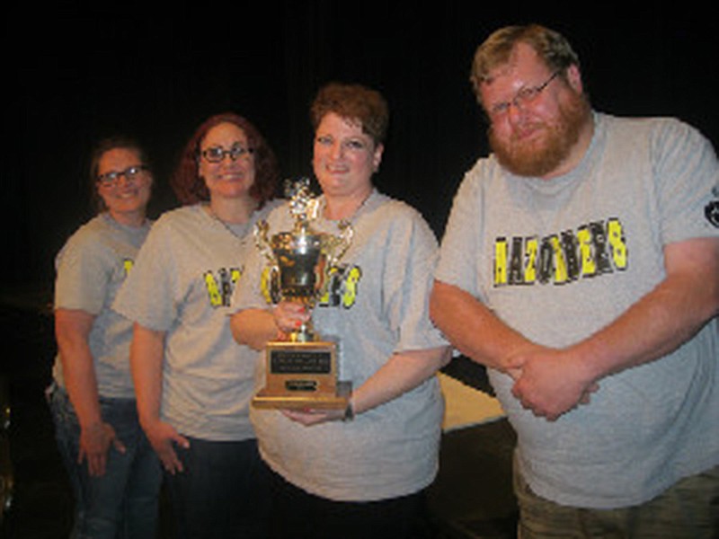 Members of the Texarkana, Ark., School District team celebrate winning the final round of competition in the 2019 25th annual Literacy Council's Corporate Spelling Bee. 