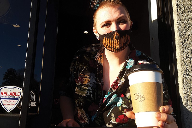 Chuck Taramona, manager of Brewsters on the Boulevard, has been in the practice of service with a smile ever since Brewsters opened. Even with a mask on, she has a toothy grin for her customers as they drive through.