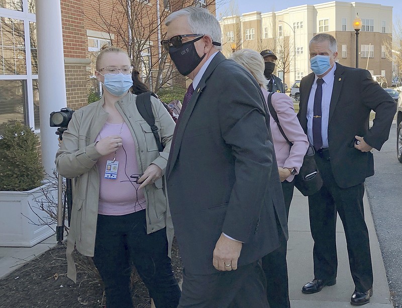 Missouri Gov. Mike Parson enters a St. Louis senior center on Thursday, March 4 in St. Louis. The center was the site of a coronavirus vaccination event. (AP Photo by Jim Salter)