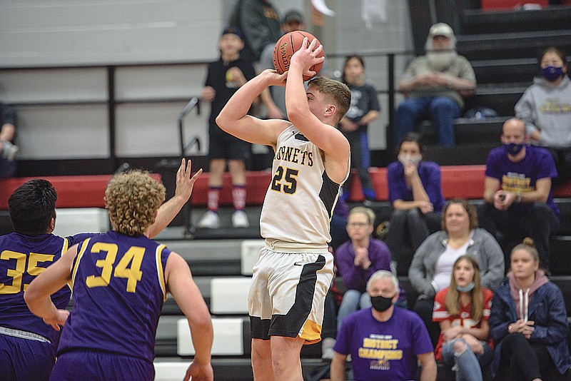 Brock Lucas of St. Elizabeth goes up for a shot to beat the halftime buzzer during Friday night's Class 1 quarterfinal game against Thomas Jefferson Independent at Eugene High School.
