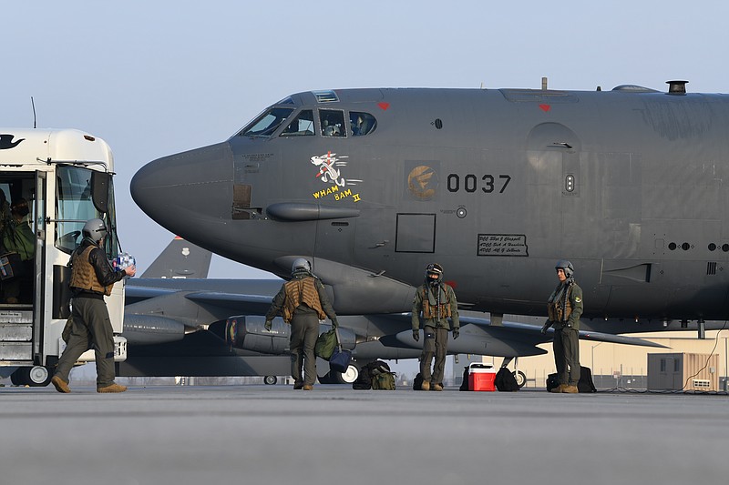 Pilots from the 69th Bomb Squadron board B-52H Stratofortress bomber "Wham Bam II" in preparation for a flight over the Mideast on March 6, 2021, at Minot Air Force Base, North Dakota. A pair of B-52 bombers flew over the Mideast on Sunday, March 7, 2021, the latest such mission in the region aimed at warning Iran amid tensions between Washington and Tehran. (U.S. Air Force/Senior Airman Josh W. Strickland via AP)