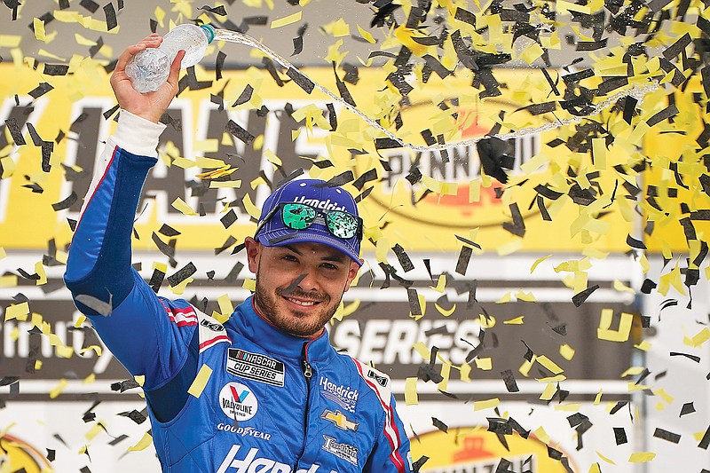 Kyle Larson celebrates Sunday after winning the NASCAR Cup Series in Las Vegas.