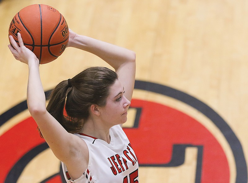 Jefferson City's Grafton Craighead looks for someone to pass to during last Thursday night's Class 6 District 9 title game at Fleming Fieldhouse.