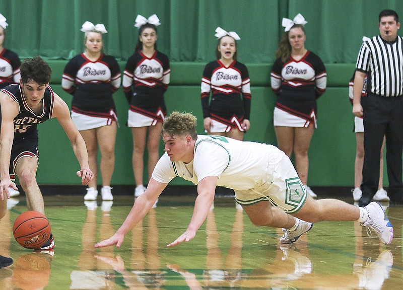 Brysan Jeffries of Blair Oaks dives after a loose ball during Tuesday's Class 4 sectional game against Buffalo in Wardsville.
