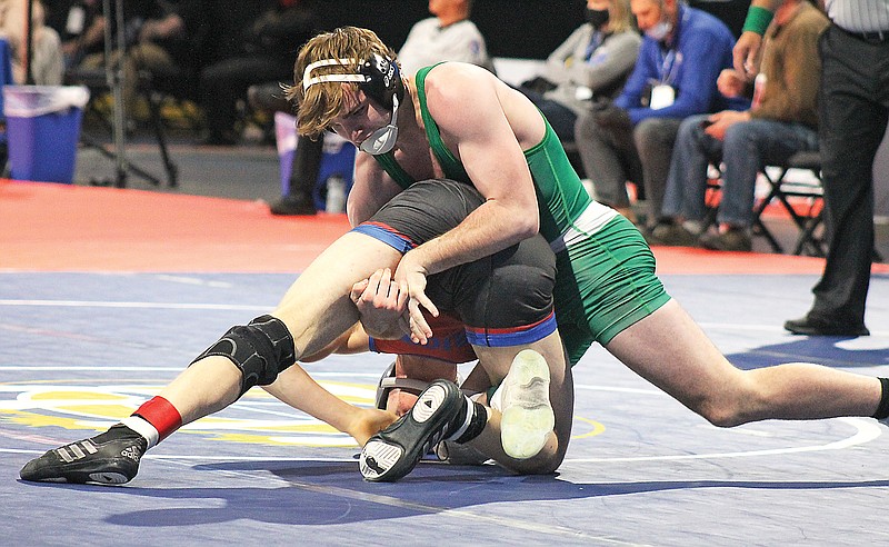 Camden Meeks of Blair Oaks works to control Priory's Adam Rolwes during their third-place match at 182 pounds Thursday in the Class 2 state wrestling championships at Cable Dahmer Arena in Independence.
