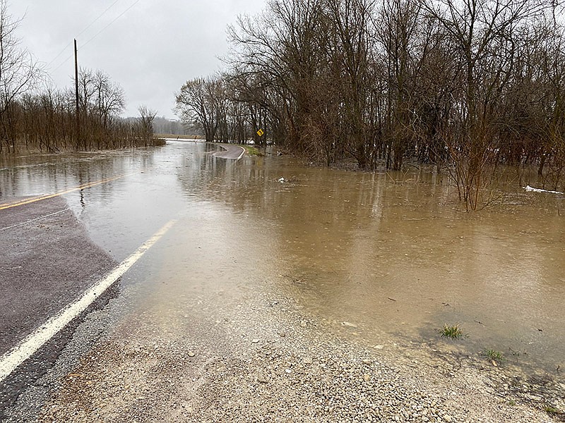 Water covers Buffalo Road at Honey Creek in Cole County on Thursday, March 18, 2021.