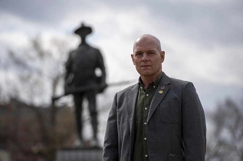 former Lt. Col. Todd Scattini, an Army veteran and licensed medical cannabis user who advocates for more access to medical marijuana for veterans, poses in March 2021.  (Shelly Yang/The Kansas City Star via AP)