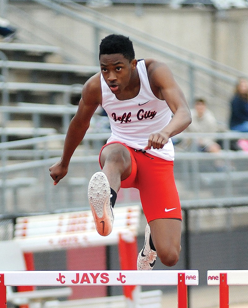 Charles Burns of Jefferson City competes Monday in the 300-meter hurdles at Adkins Stadium.