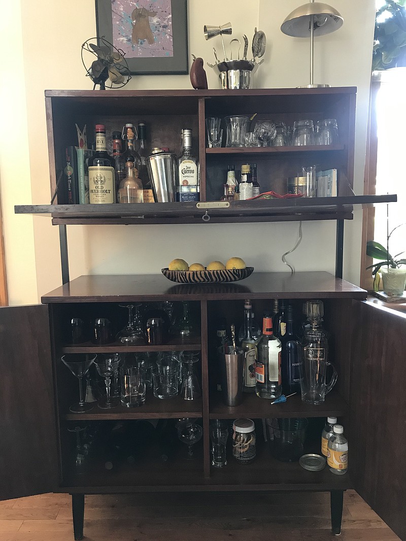 Valerie Schremp Hahn and her husband Andy found the wood cabinet pieces of this bar for $50 at a thrift store and pieced it together to make a home bar. (Valerie Schremp Hahn/St. Louis Post-Dispatch/TNS)