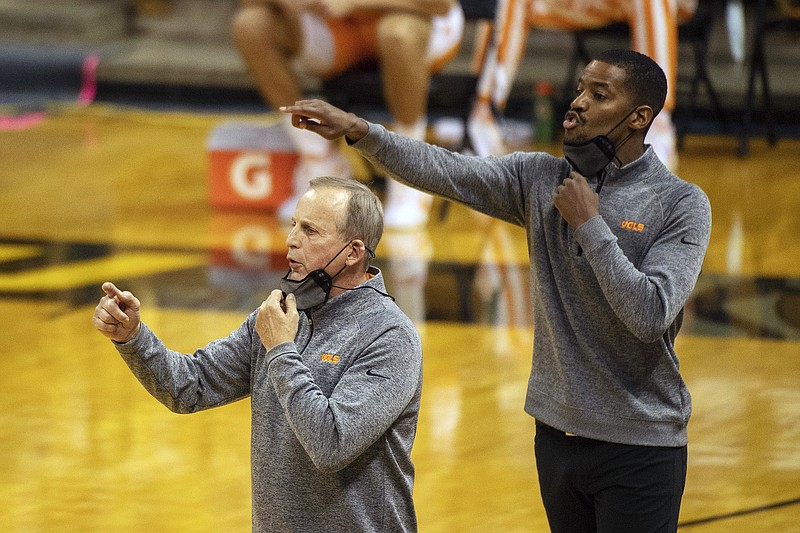 In this Dec. 30, 2020, file photo, Tennessee head coach Rick Barnes (left) and assistant coach Kim English position their players during the first half of a game against Missouri at Mizzou Arena.