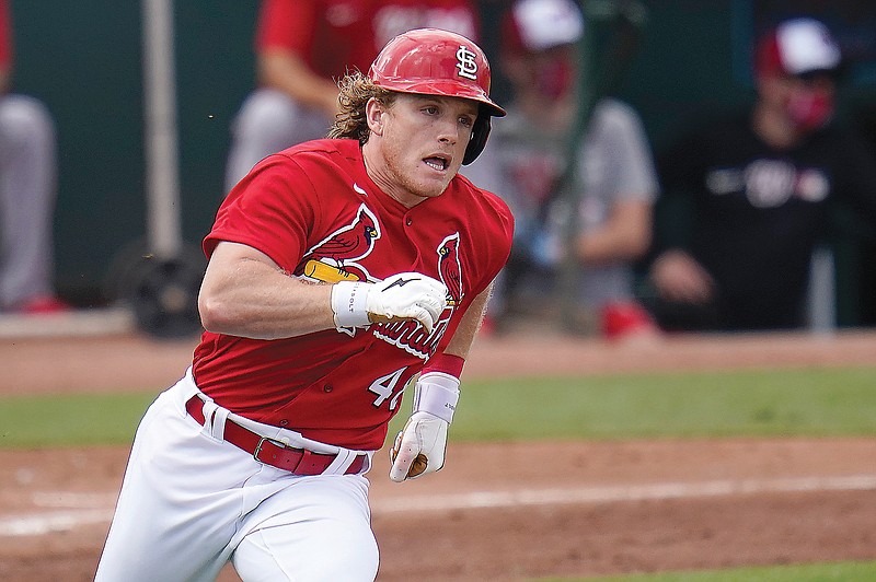 Harrison Bader of the Cardinals rounds first on an RBI double during a spring training game last month against the Nationals in Jupiter, Fla.