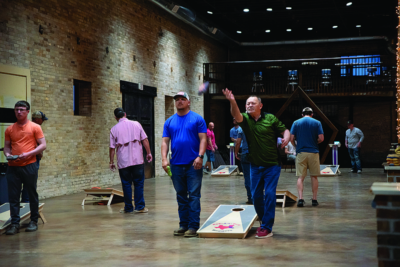 Cornhole players from across the Texarkana region meet on Tuesday nights at Crossties for a weekly tournament hosted by Ark-La-Tex Baggers.