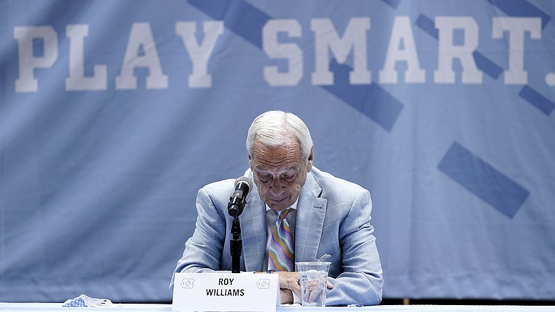 Roy Williams pauses while speaking with members of the media during a news conference, Thursday in Chapel Hill, N.C.