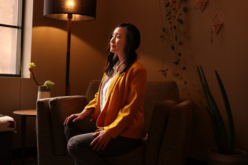 Linda Yoon, a Korean psychotherapist who runs her own practice with a colleague, has been flooded with requests for telemedicine services from across California and out of state as the mental toll of anti-Asian violence and grief continues. She poses for a portrait in her office on Saturday, March 27, 2021 in Los Angeles, California. (Dania Maxwell/Los Angeles Times/TNS)