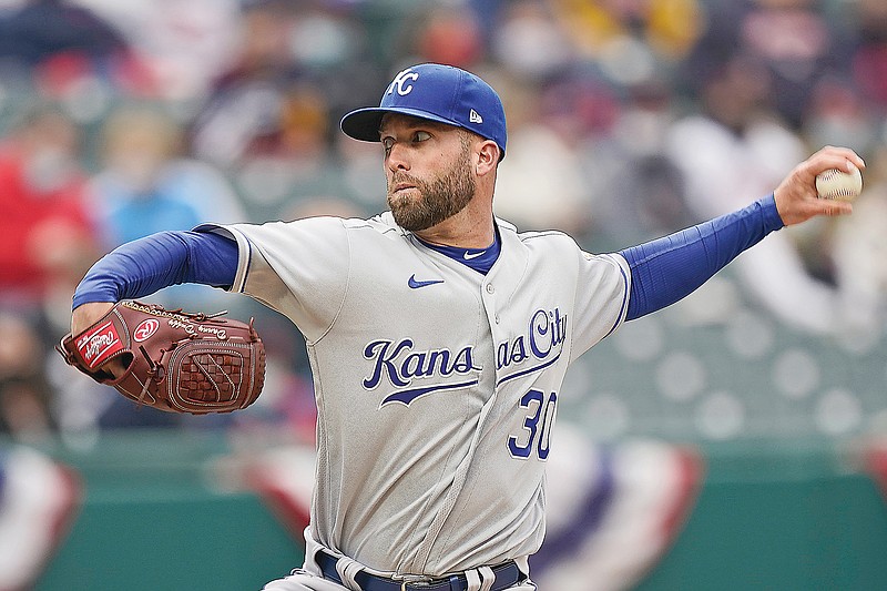 Royals starting pitcher Danny Duffy throws to the plate during Monday afternoon's game against the Indians in Cleveland.