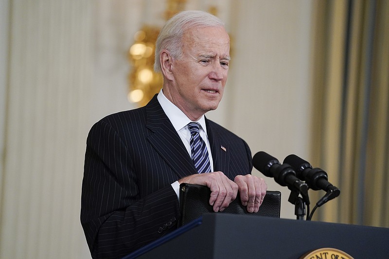 President Joe Biden delivers remarks about vaccinations, in the State Dining Room of the White House, Tuesday, April 6, 2021, in Washington. (AP Photo/Evan Vucci)