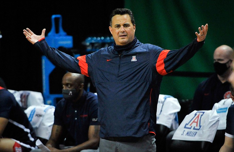 Arizona head coach Sean Miller questions a call during the second half of an NCAA college basketball game against Arizona in Eugene, Ore., in this Monday, March 1, 2021, file photo. Arizona has parted ways with men's basketball coach Sean Miller as the program awaits its fate in an NCAA infractions investigation, a person with knowledge of the situation told The Associated Press. The person told the AP on condition of anonymity Wednesday, April 7, 2021, because no official announcement has been made. (AP Photo/Andy Nelson, File)