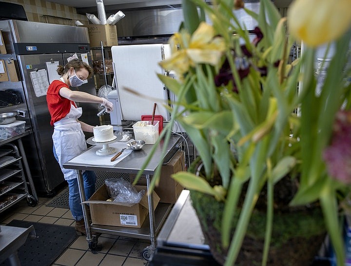 Anne Andrus, who has owned Honey + Rye Bakehouse for more than seven years, worked the kitchen, Friday, March 26, 2021 in St. Louis Park, MN. She has established a better work-life balance during the pandemic. She has taken to keeping weekends off to spend more time with her 5-year-old child.  (Elizabeth Flores/Star Tribune/TNS)