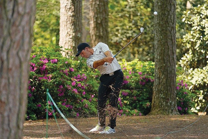 Sergio Garcia hits out of the rough on the 14th hole during a practice round Wednesday for the Masters in Augusta, Ga.