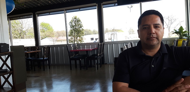 Hector Leal, owner of Loca Luna, shows off one of the dining areas of the new location on 5200 W. Seventh St., Wake Village. He credits the work of his staff as well as the patronage of their customers for being able to open this second location.