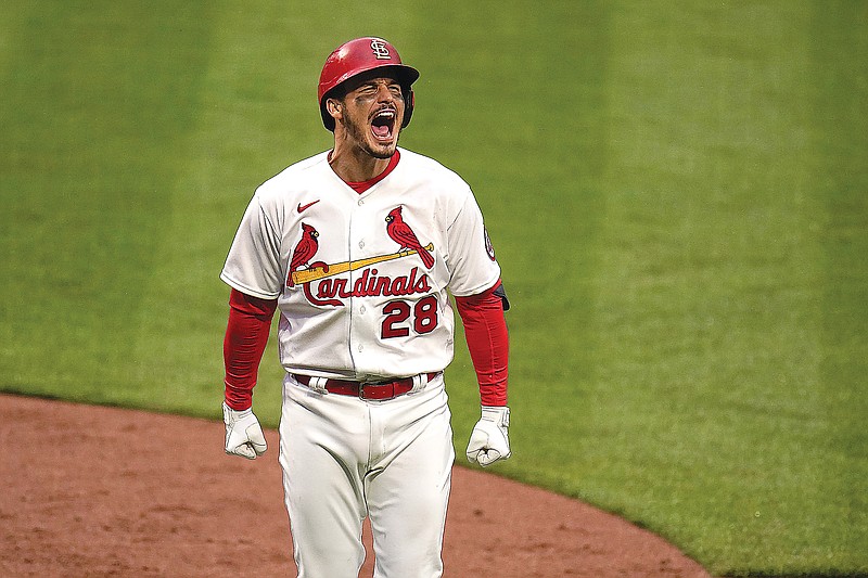 Nolan Arenado of the Cardinals celebrates after hitting a two-run home run during the eighth inning of Thursday's game against the Brewers at Busch Stadium.