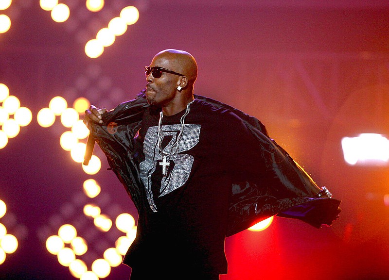 DMX performs during the BET Hip Hop Awards in Atlanta on Oct. 1, 2011. The family of rapper DMX says he has died at age 50 after a career in which he delivered iconic hip-hop songs such as "Ruff Ryders' Anthem." A statement from the family says the Grammy-nominated rapper died at a hospital in White Plains, New York, "with his family by his side after being placed on life support for the past few days. He was rushed to a New York hospital from his home April 2. (AP Photo/David Goldman, File)