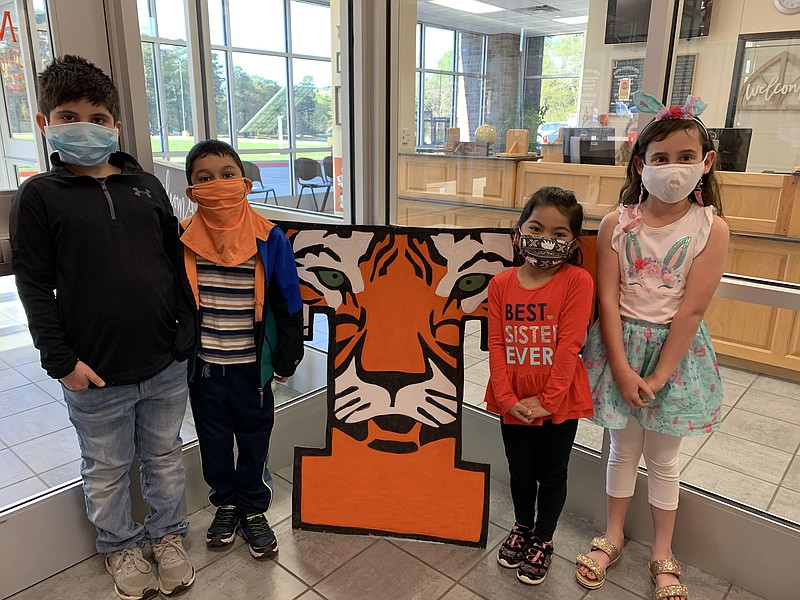 Team Tiger Sharks, from left, Maddox Gomez, Haatib Fayyaz, Olivia Catamin and Lizzy Lagrone.