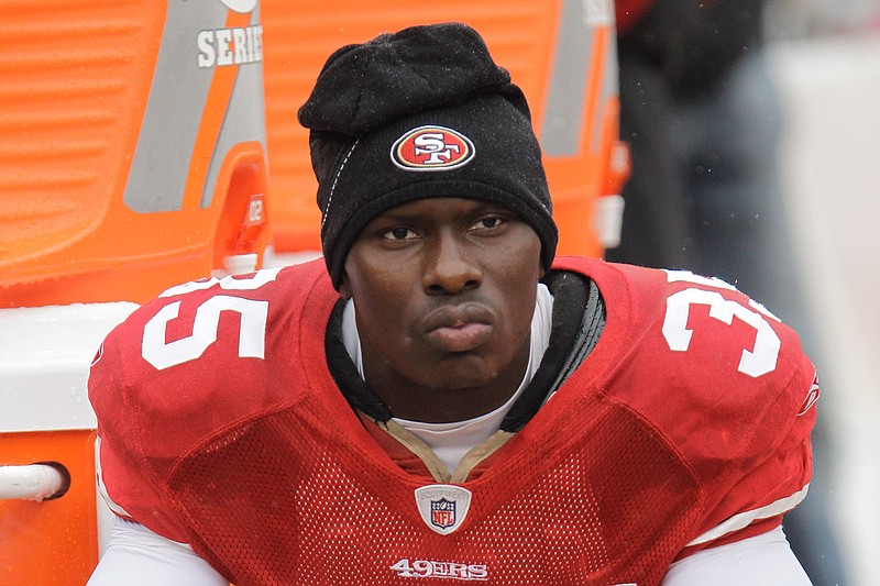 In this Oct. 17, 2010 file photo, San Francisco 49ers cornerback Phillip Adams (35) sits on the sideline during the first quarter of an NFL football game in San Francisco. A source briefed on a mass killing in South Carolina says the gunman who killed multiple people, including a prominent doctor, was the former NFL pro.  The source said that Adams shot himself to death early Thursday, April 8, 2021. (AP Photo/Paul Sakuma, File)