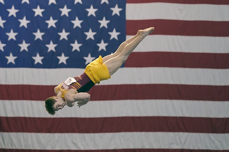 In this Feb. 28 file photo, Michael Moran of the University of Minnesota competes during the Winter Cup gymnastics event in Indianapolis.