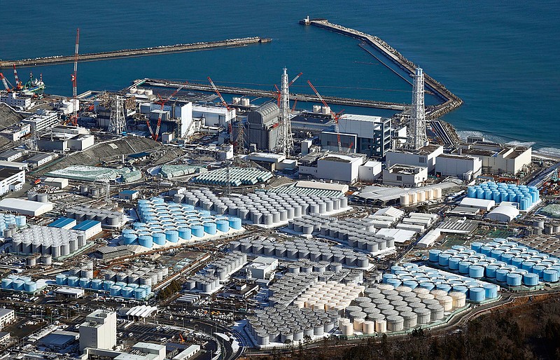 An aerial photo shows Fukushima Daiichi nuclear power plant in Okuma town, Fukushima Prefecture in January, 2021. The Japanese government has decided to get rid of the massive amounts of treated but still radioactive water stored in tanks at the wrecked Fukushima nuclear plant by releasing it into the Pacific ocean, a conclusion widely expected but delayed for years amid protests and safety concerns. Prime Minister Yoshihide Suga on Wednesday, April 7, 2021, told top fisheries association officials that his government believes the release to sea is the most realistic option and a final decision will be made "with days."(Kota Endo/Kyodo News via AP)