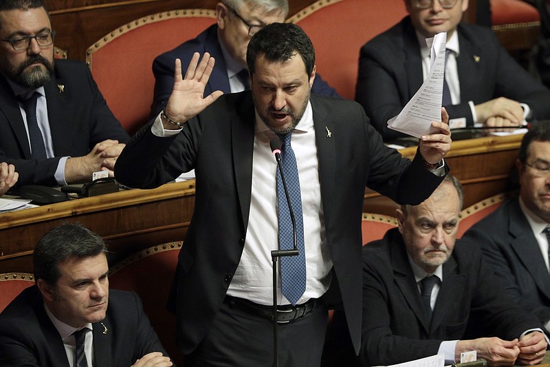 FILE - In this Feb. 12, 2020 file photo, then opposition leader Matteo Salvini speaks at the end of the debate at the Italian Senate on whether to allow him to be prosecuted, as he demands to be, for alleging holding migrants hostage for days aboard coast guard ship Gregoretti instead of letting them immediately disembark in Sicily, while he was interior minister, in Rome. An Italian prosecutor on Saturday, April 10, 2021 told a court that there's no reason to order right-wing leader Salvini to stand trial for alleged kidnapping for his role in keeping rescued migrants aboard a coast guard ship for days in summer 2019. (AP Photo/Andrew Medichini, file)