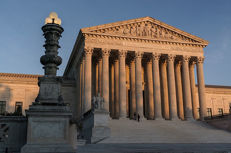 In this Nov. 6, 2020, file photo, the Supreme Court is seen at sundown in Washington. The Supreme Court is telling California that it can't enforce coronavirus-related restrictions that have limited home-based religious worship including Bible studies and prayer meetings.The order from the court late Friday, April 9, 2021, is the latest in a recent string of cases in which the high court has barred officials from enforcing some coronavirus-related restrictions applying to religious gatherings. (AP Photo/J. Scott Applewhite, File)