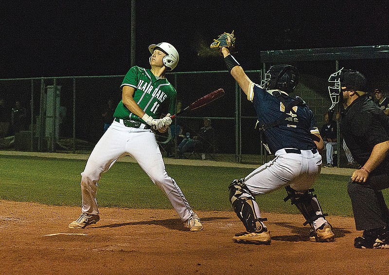 Gavin Wekenborg of Blair Oaks backs away from a pitch to Helias catcher Ethan Holzhauser during Friday night's game in the Jay Baseball Classic at the American Legion Post 5 Sports Complex.