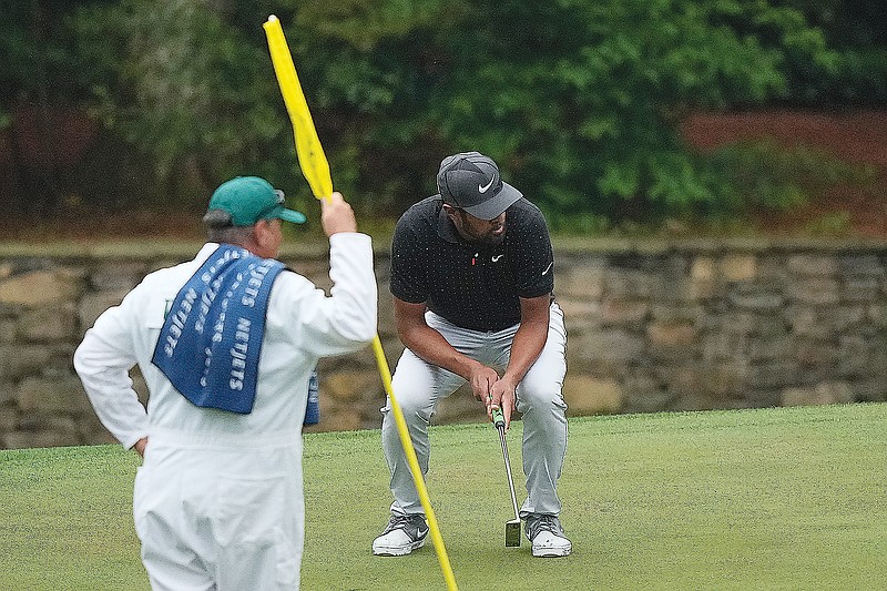 Tony Finau reacts after missing a birdie putt on the 11th hole during Saturday's third round of the Masters in Augusta, Ga.